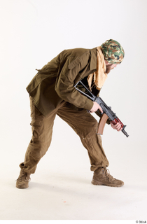 Andrew Elliott Pose with Gun aiming gun crouching standing whole…